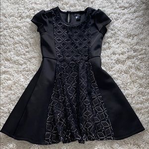 Girls dress with black lace on the front